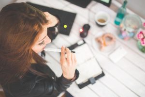 woman thinking about getting help from a tax advisor