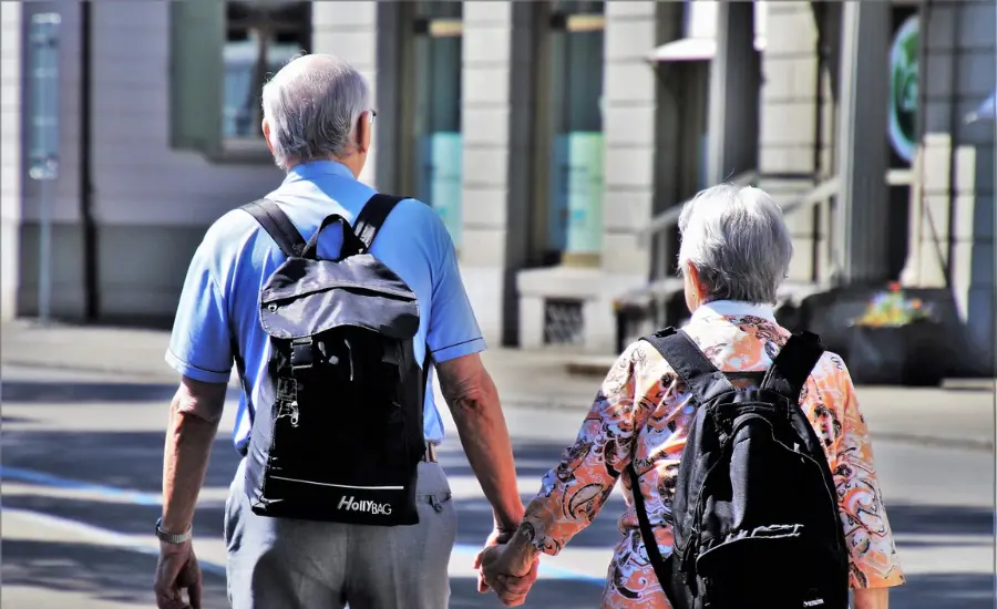 elderly couple walking