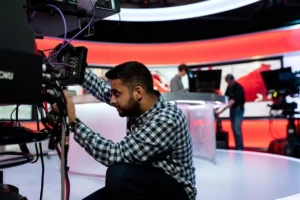 production crew working on a television set