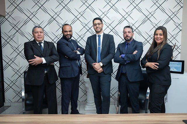 a group of legal professionals posing