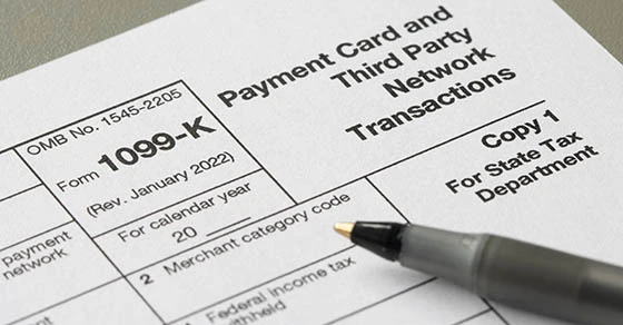 1099k tax form with a pen on top