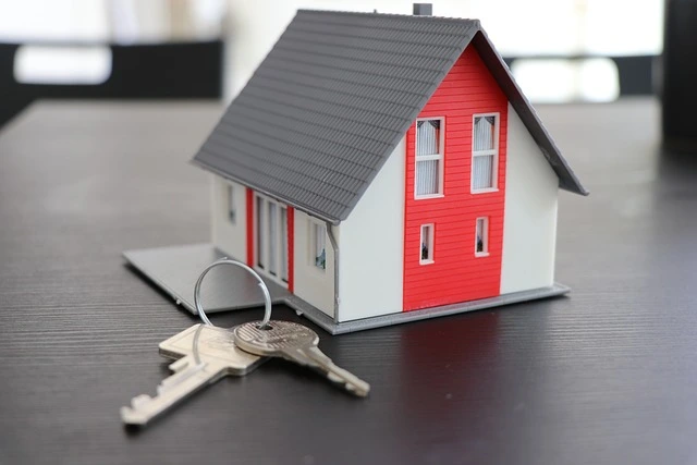 model of a house and keys showing ownership
