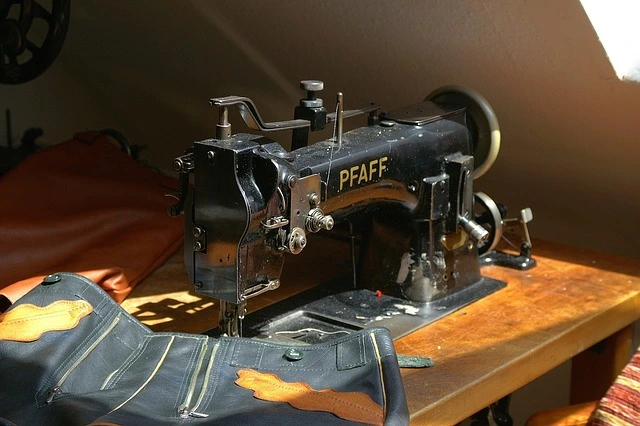 sewing-machine-used-in-a-sustainable-fashion-clothes-making sewing machine used in a sustainable fashion clothes making