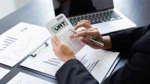 VAT being calculated on a calculator by the tax accountant