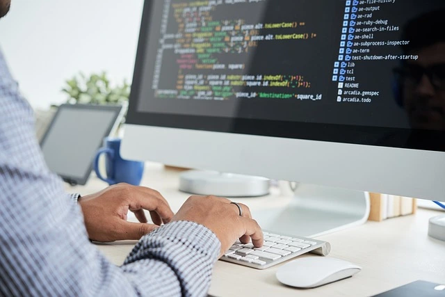 software testing being done by a tester on his computer