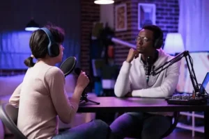 two podcasters in their studio