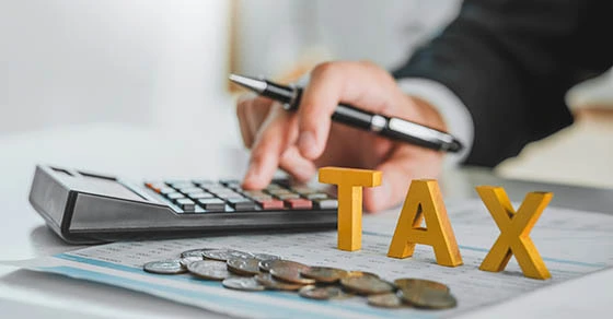 business man doing his taxes business man doing his taxes