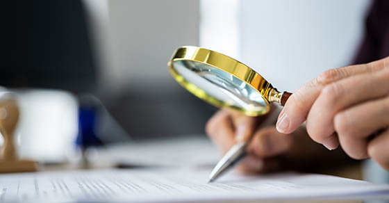 Auditor,Doing,Tax,Fraud,Investigation,Using,Magnifying,Glass Auditor Doing Tax Fraud Investigation Using Magnifying Glass